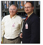 I'm with Dennis Tucker, publisher of Whitman Publishing, next to bins of coin ballistic bags in the mint vault storage area.